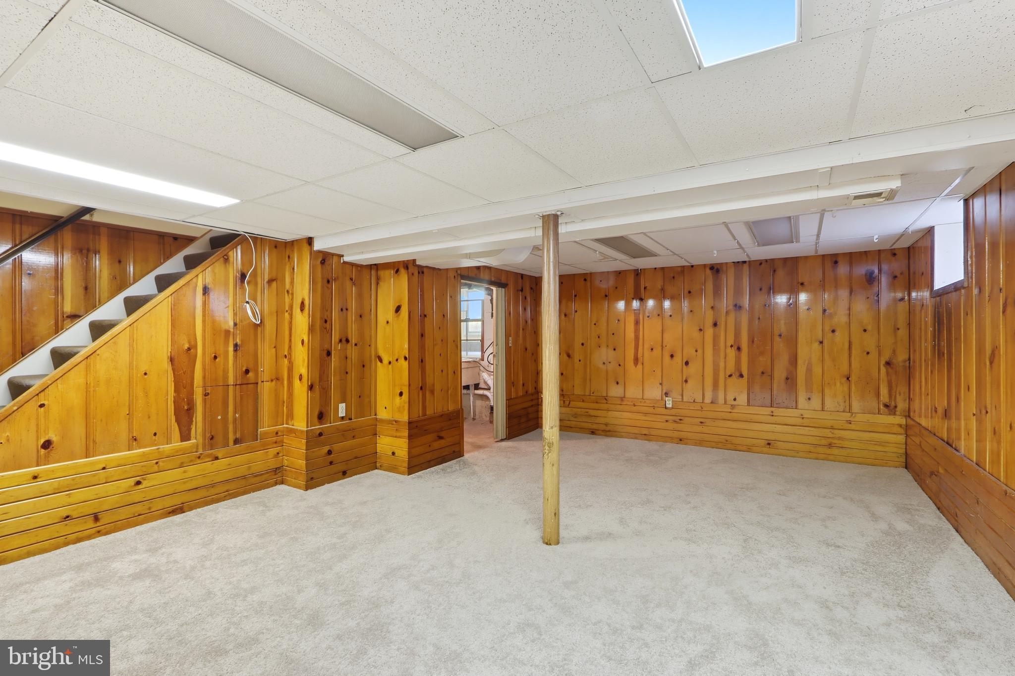 60 South Ritters Lane Owings Mills, MD 21117 - Photo 21 of 31 Spacious basement with warm wood accents.