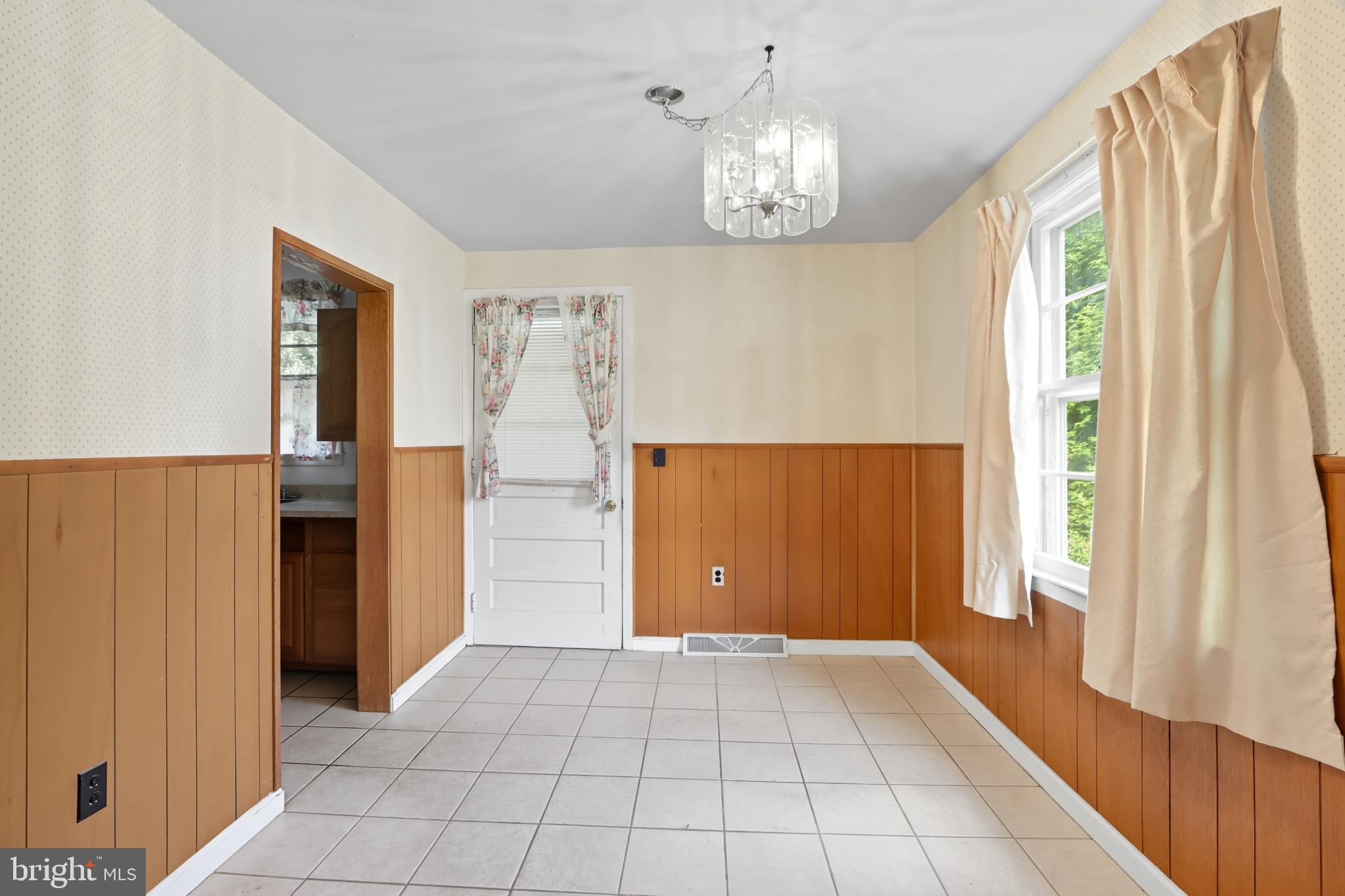 60 South Ritters Lane Owings Mills, MD 21117 - Photo 7 of 31 Charming dining room with warm wood accents.