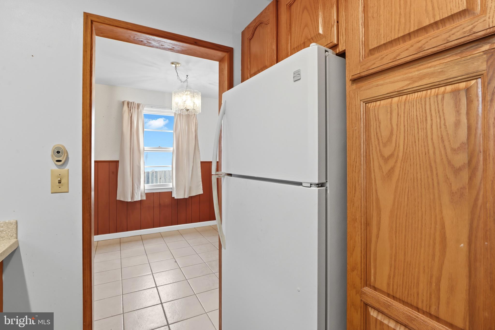 60 South Ritters Lane Owings Mills, MD 21117 - Photo 10 of 31 Cozy kitchen with classic oak cabinetry.