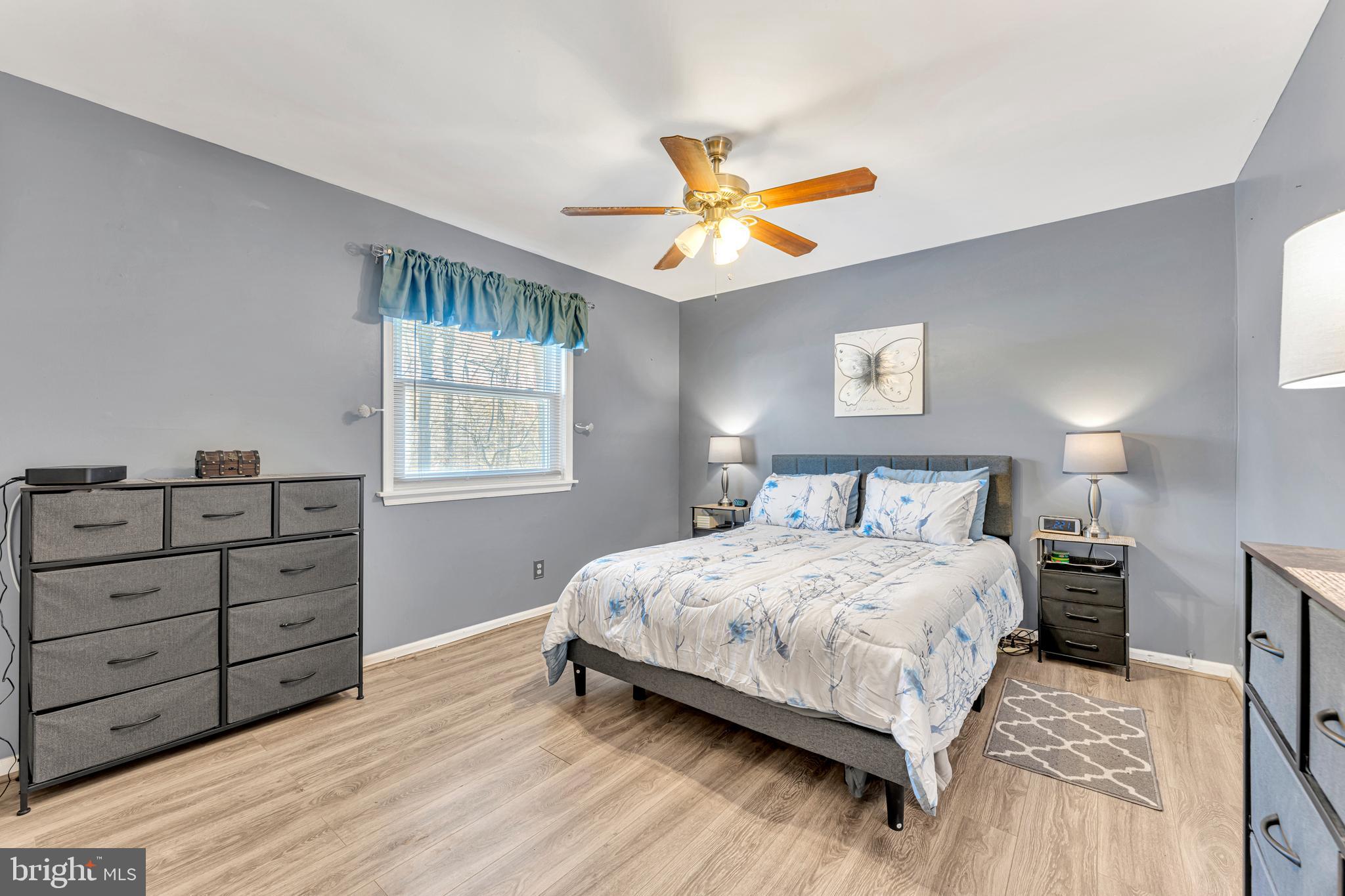 4 Barbara Place Somerdale, NJ 08083 - Photo 21 of 36 a bedroom with a bed and a window