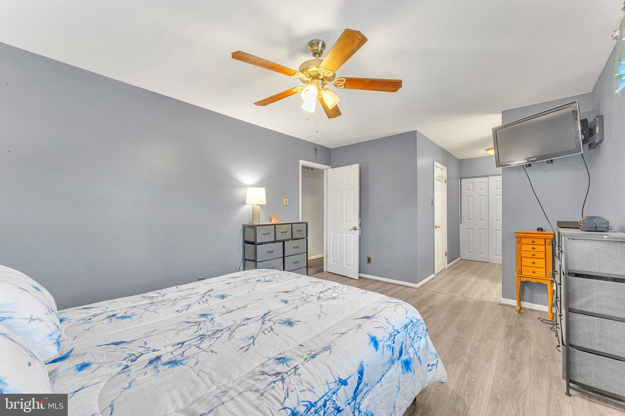 4 Barbara Place Somerdale, NJ 08083 - Photo 22 of 36 a bedroom with a bed and a chandelier