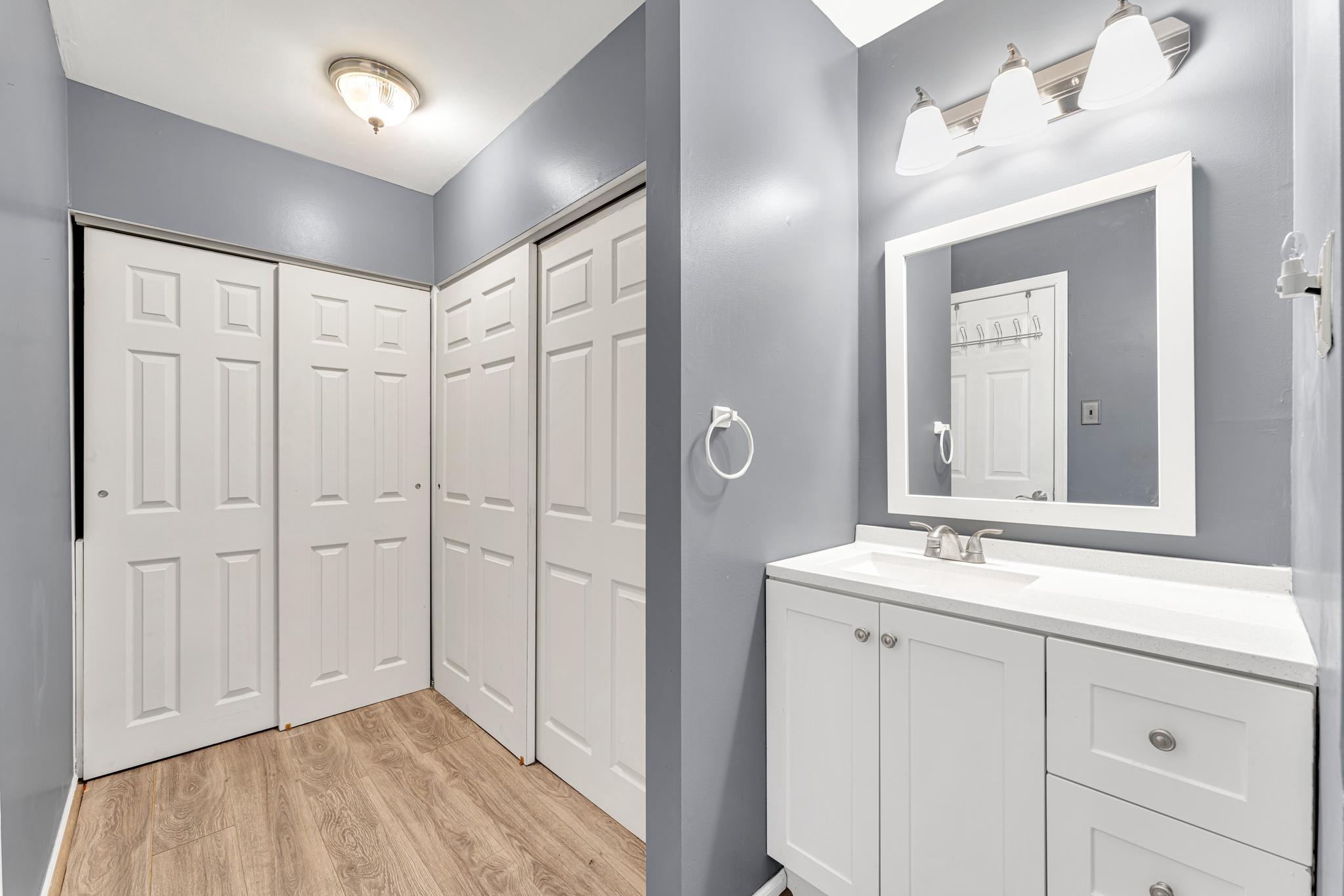 4 Barbara Place Somerdale, NJ 08083 - Photo 23 of 36 a bathroom with a sink and a mirror