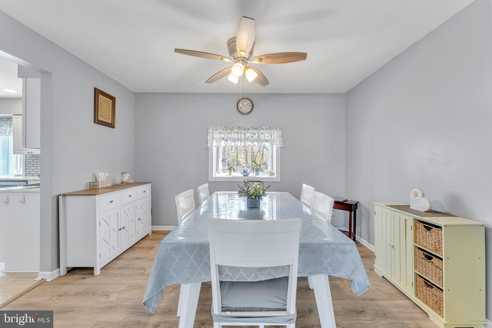 4 Barbara Place Somerdale, NJ 08083 - Photo 6 of 36 a view of a dining room with furniture window and wooden floor