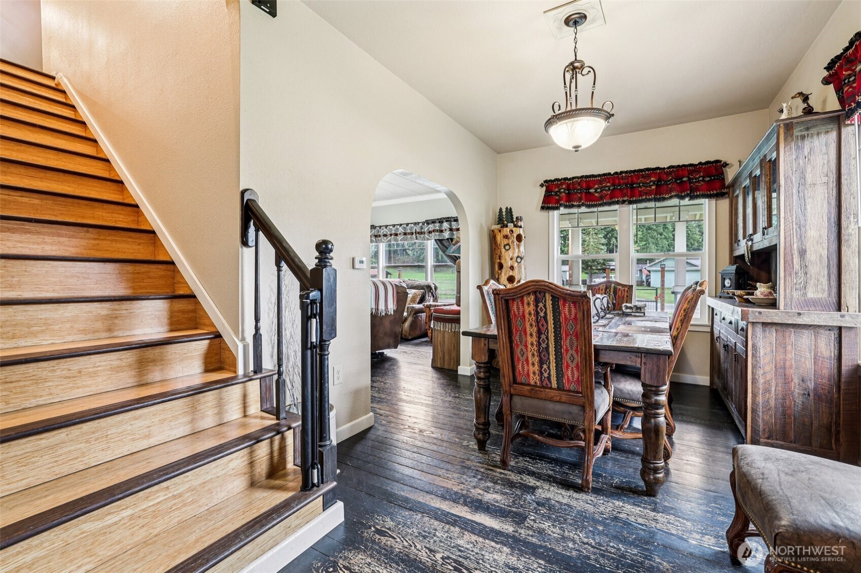 537 McNaught Road South Roy, WA 98580 - Photo 16 of 32 a view of a livingroom with furniture wooden floor and windows