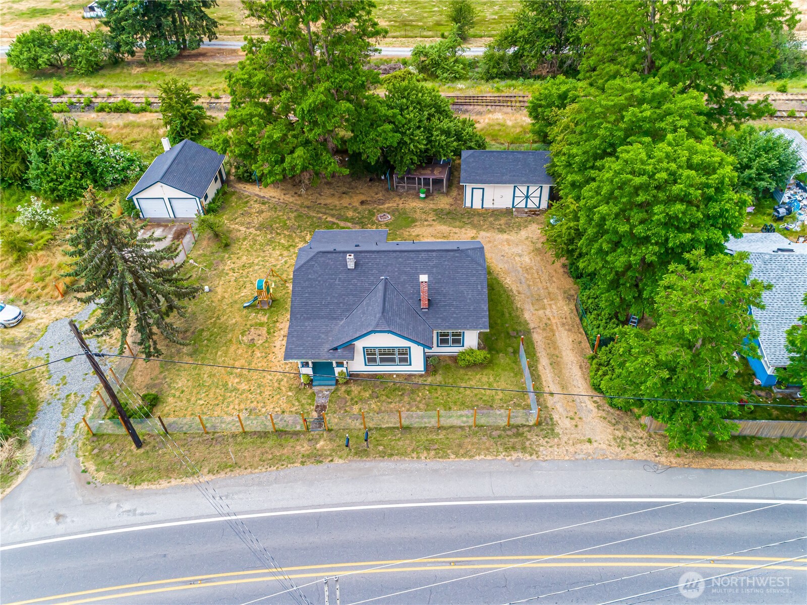 537 McNaught Road South Roy, WA 98580 - Photo 2 of 32 an aerial view of a house with a swimming pool
