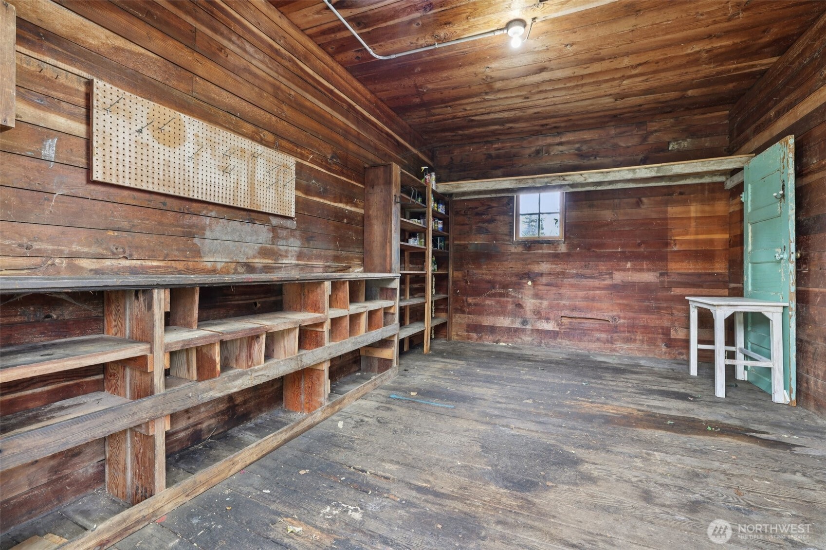 537 McNaught Road South Roy, WA 98580 - Photo 26 of 32 a view of a room with shelves
