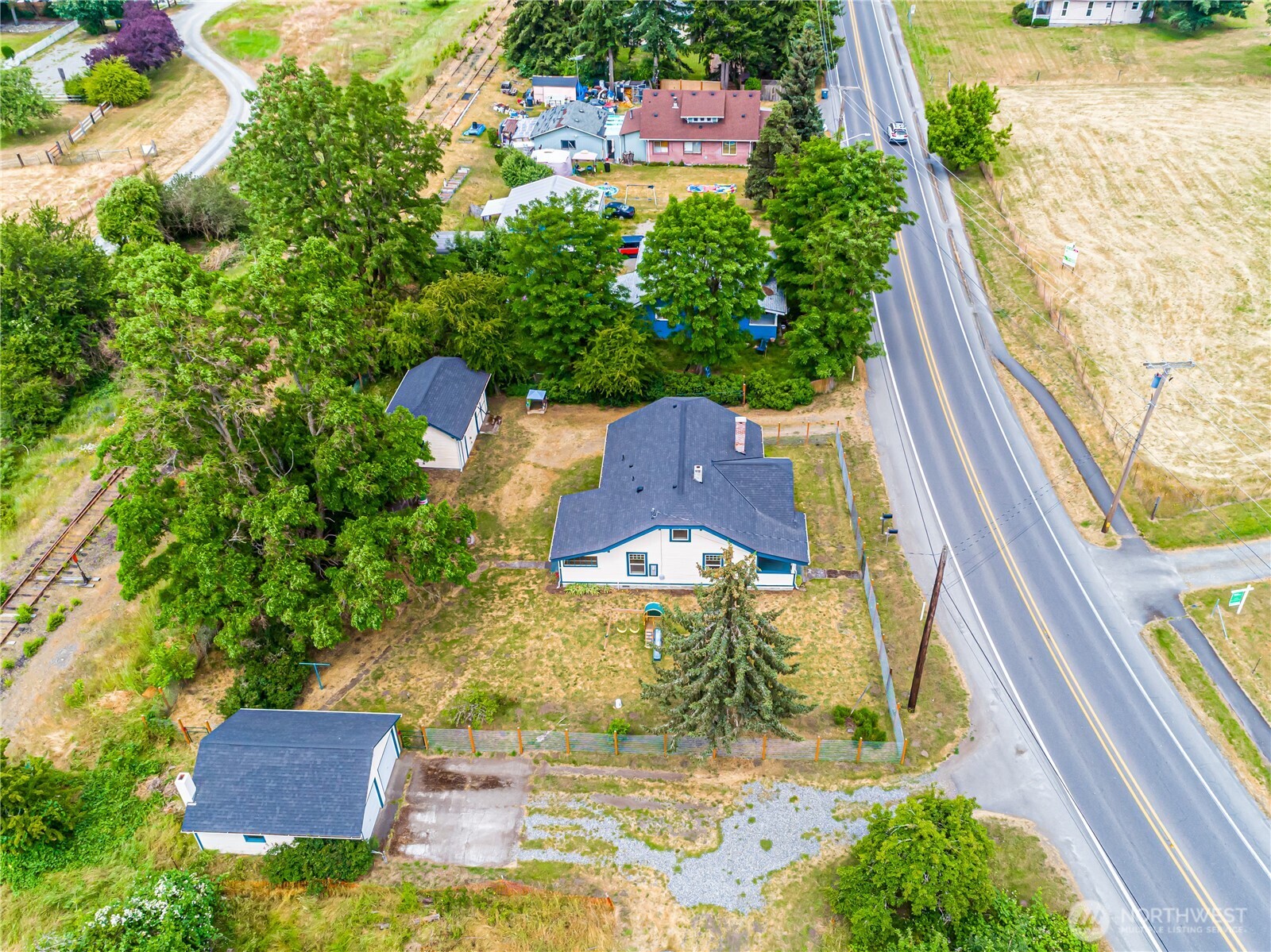 537 McNaught Road South Roy, WA 98580 - Photo 30 of 32 an aerial view of residential houses with yard