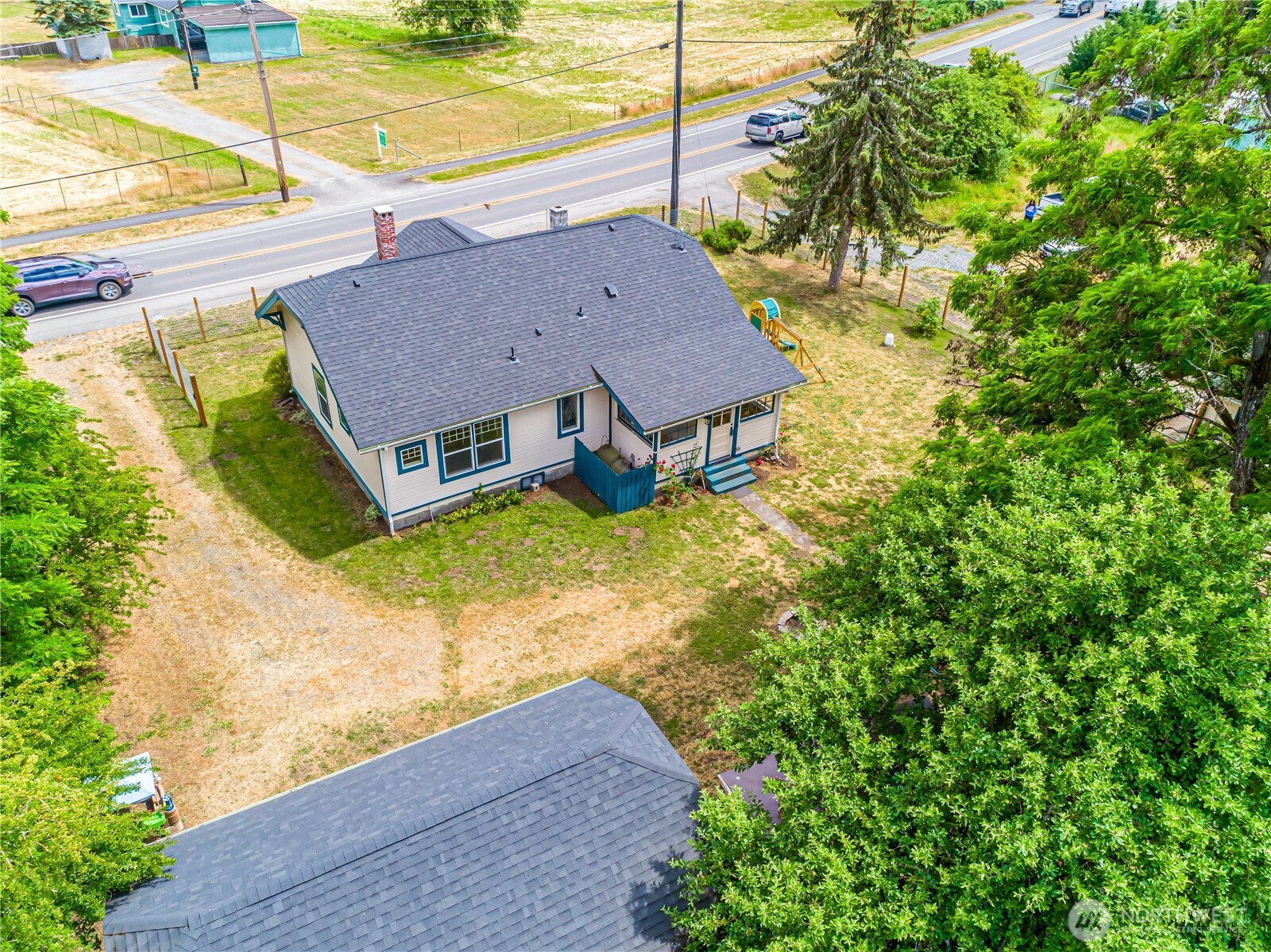 537 McNaught Road South Roy, WA 98580 - Photo 31 of 32 a view of a house with a yard