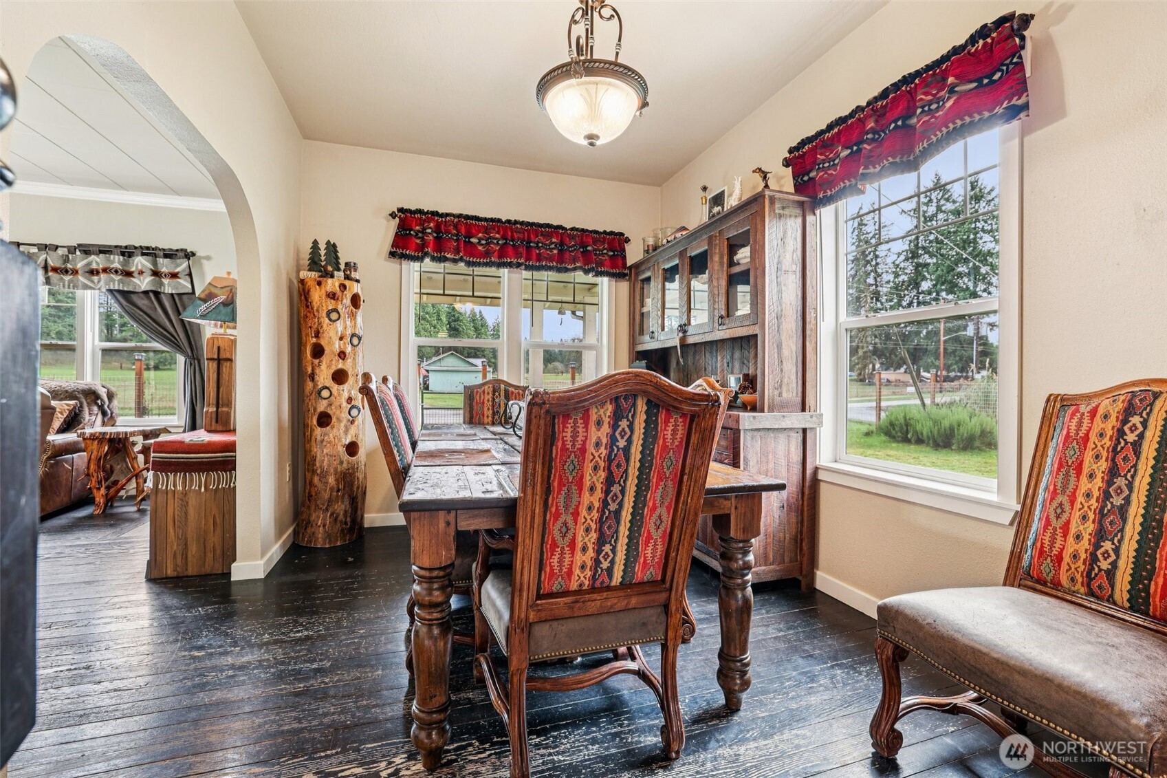 537 McNaught Road South Roy, WA 98580 - Photo 6 of 32 a view of a dining room with furniture window and wooden floor