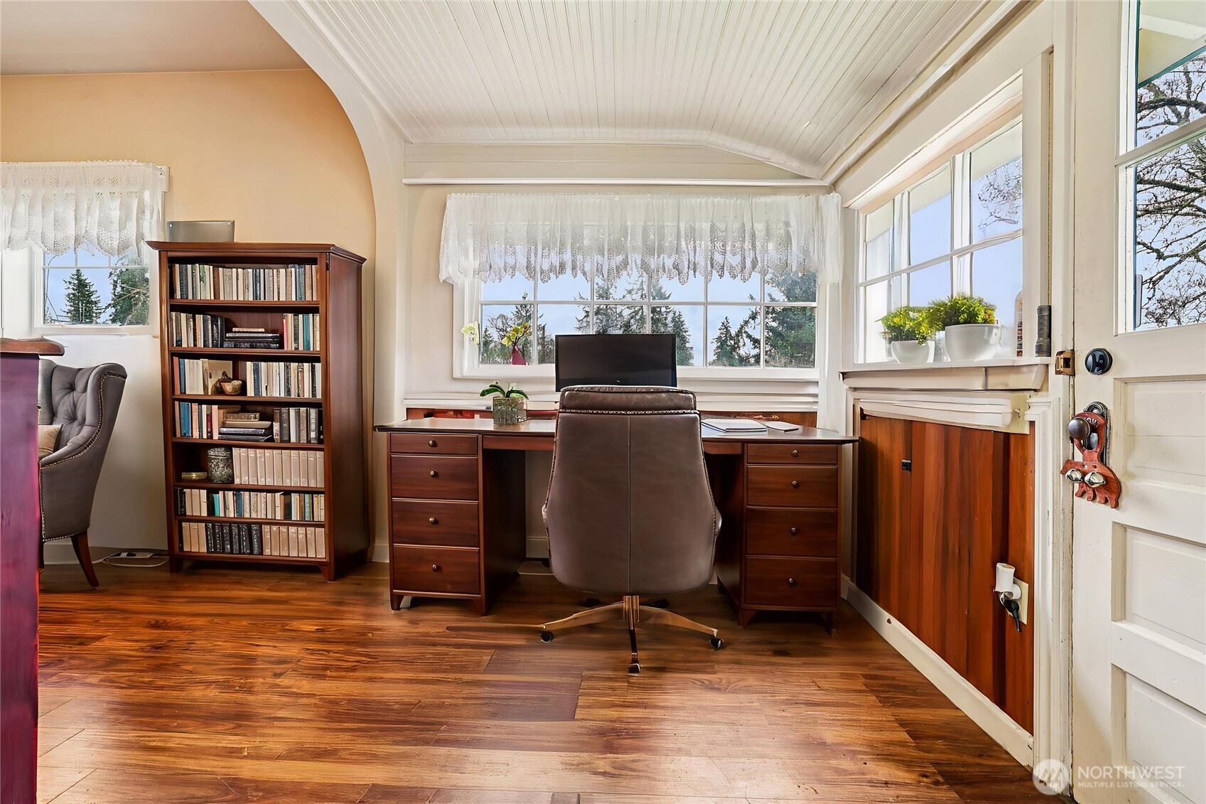 537 McNaught Road South Roy, WA 98580 - Photo 10 of 32 a view of a workspace with furniture and a window