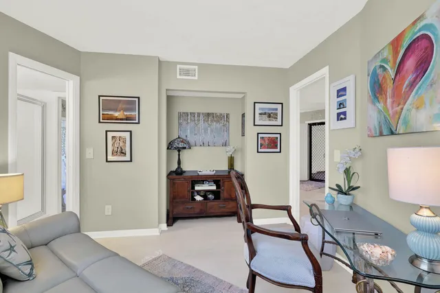 a view of a livingroom with furniture and window