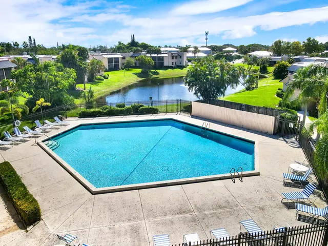 a view of a park with seating space