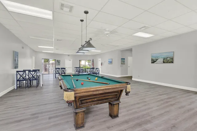 a kitchen with cabinets and white appliances