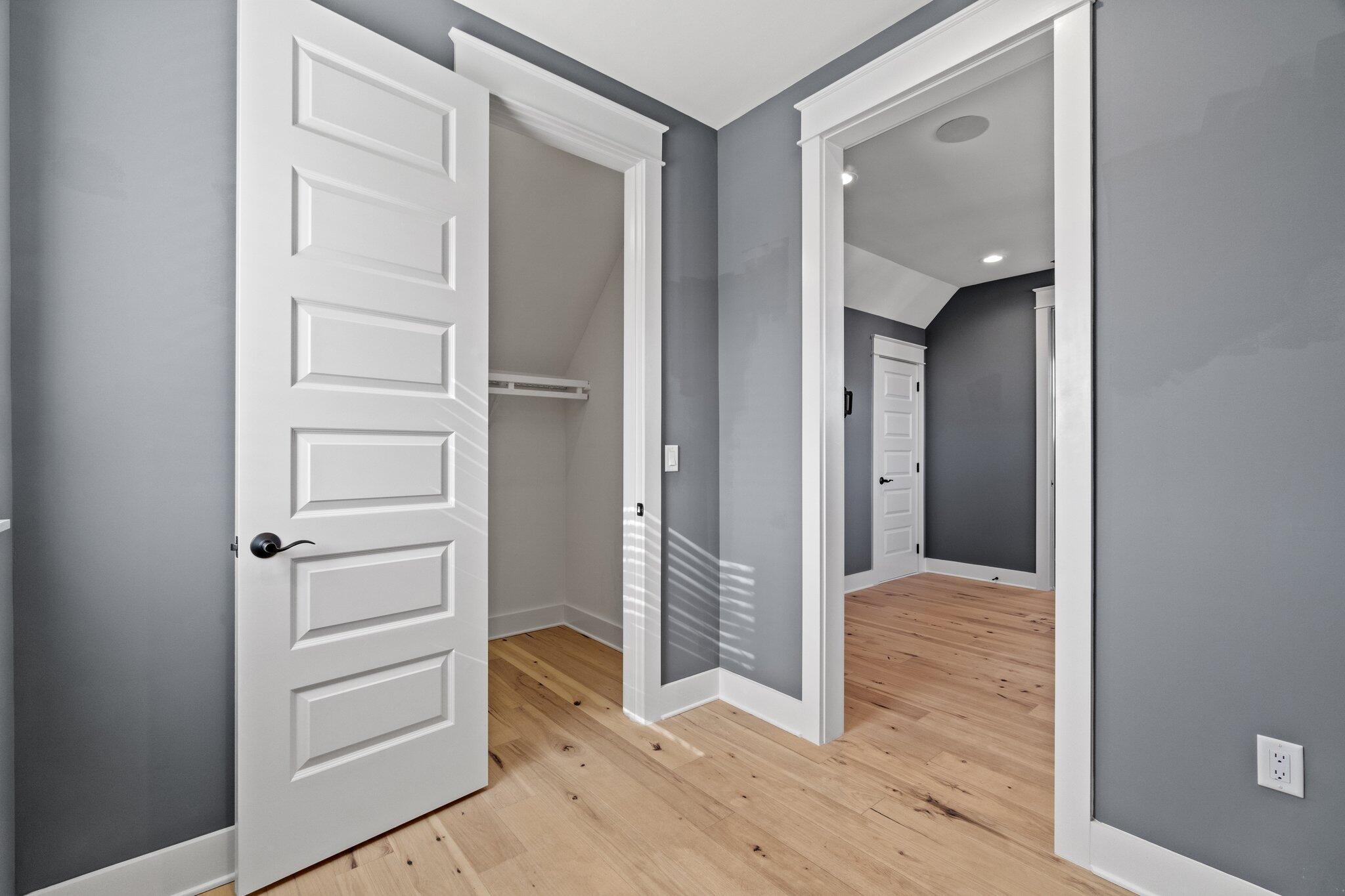 414 Ridgewalk Circle Santa Rosa Beach, FL 32459 - Photo 26 of 43 a view of a hallway with wooden floor