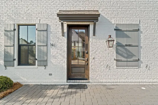 a view of wooden door of the house