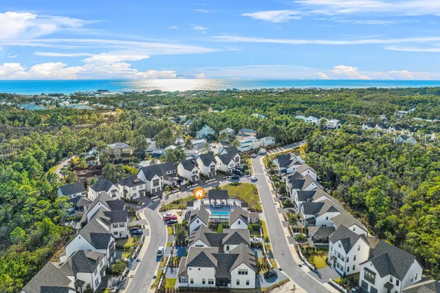 an aerial view of a city with lots of residential buildings