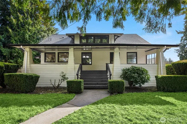 front view of a house with a garden