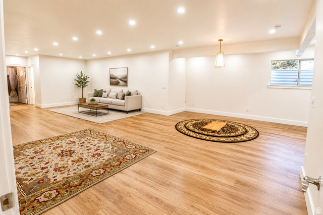 1055 North 1000 East Mapleton, UT 84664 - Photo 52 of 112 Spacious room featuring wood-finish flooring, recessed lighting, and crisp white walls