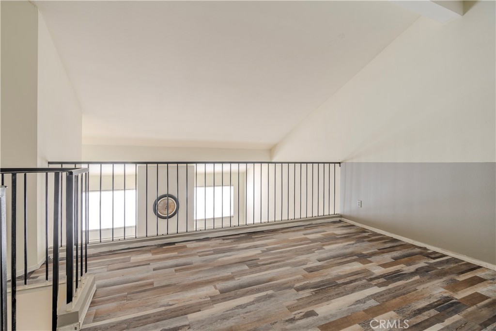 3366 Darby Street, Unit 435 Simi Valley, CA 93063 - Photo 12 of 19 a view of a livingroom with wooden floor