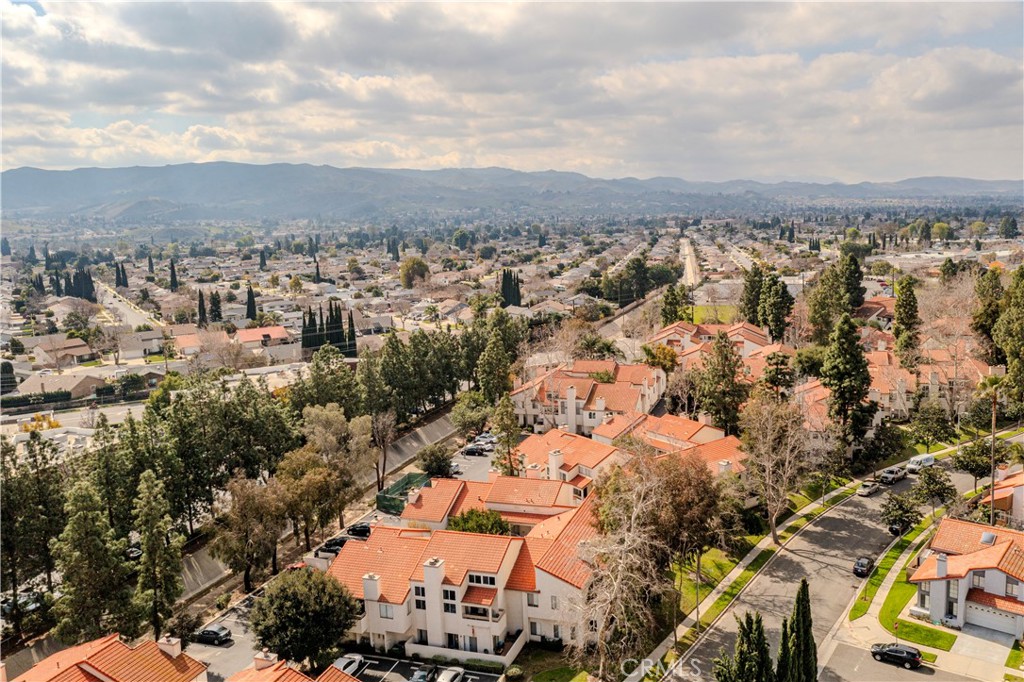3366 Darby Street, Unit 435 Simi Valley, CA 93063 - Photo 4 of 19 an aerial view of residential building with green space