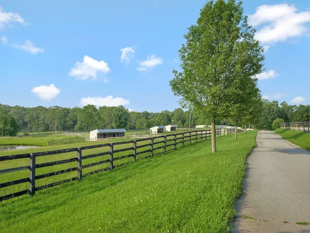 a view of a house with a big yard