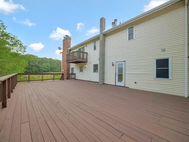 a view of a house with a deck