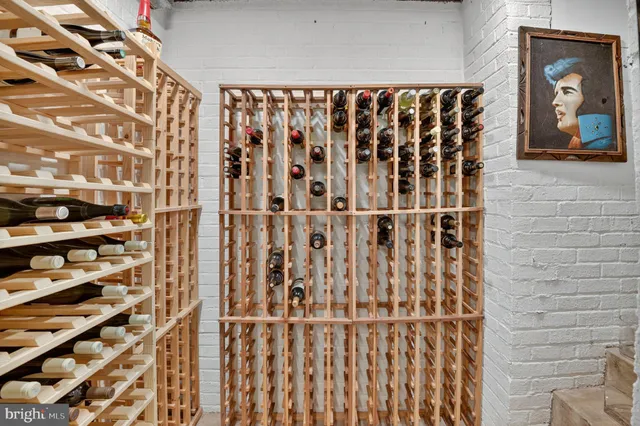 a view of a patio with table and chairs and potted plants