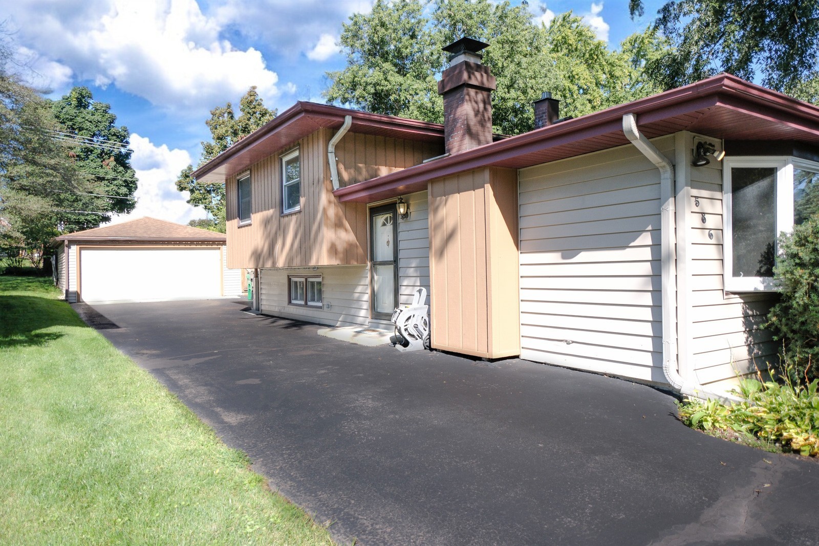 S586 East Street Winfield, IL 60190 - Photo 1 of 29 a view of a house with a yard