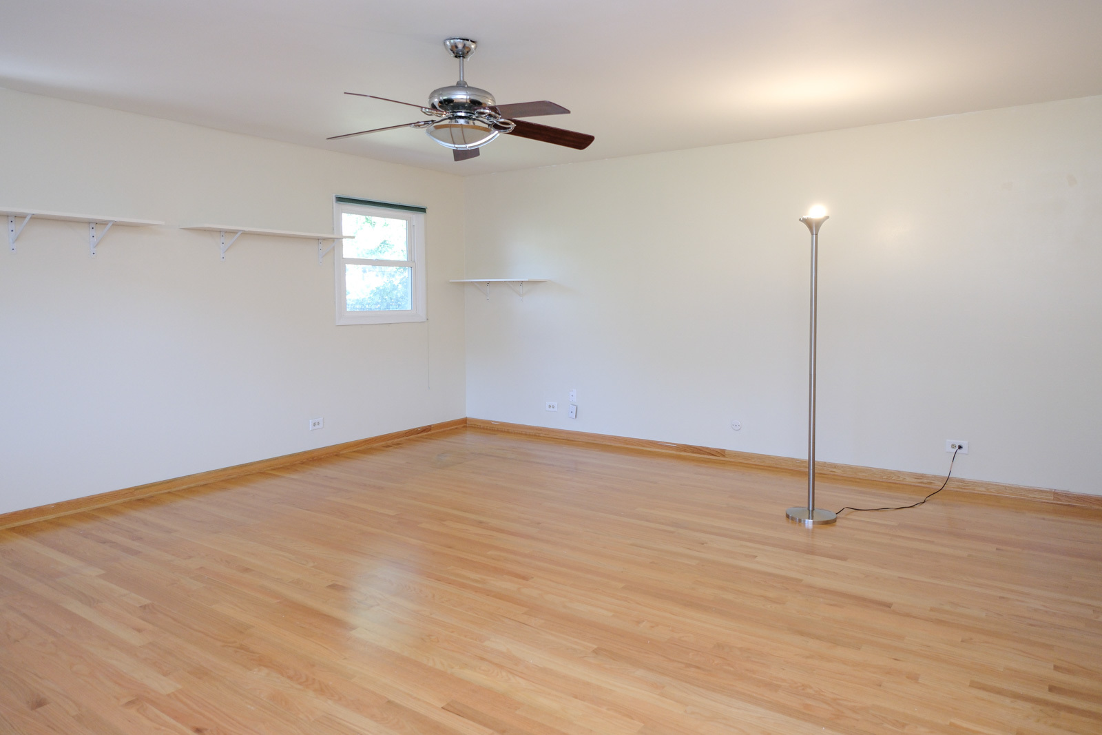 S586 East Street Winfield, IL 60190 - Photo 19 of 29 a view of empty room with wooden floor