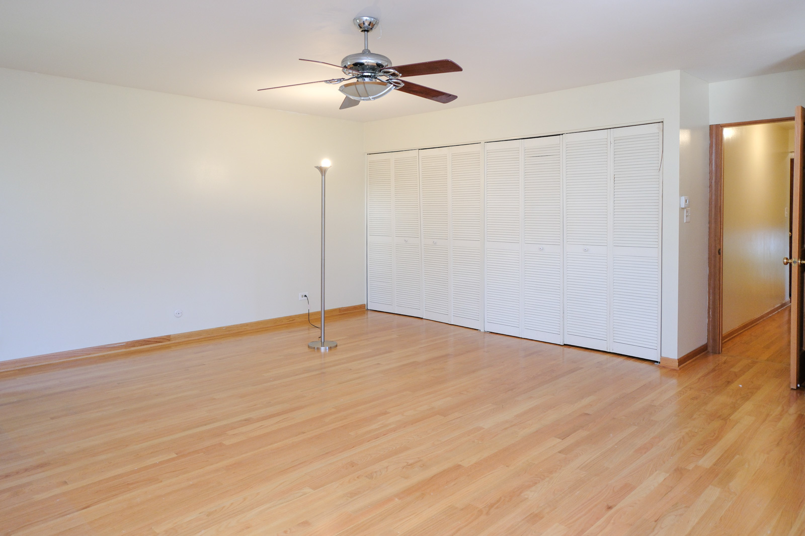 S586 East Street Winfield, IL 60190 - Photo 20 of 29 a view of an empty room with a fan