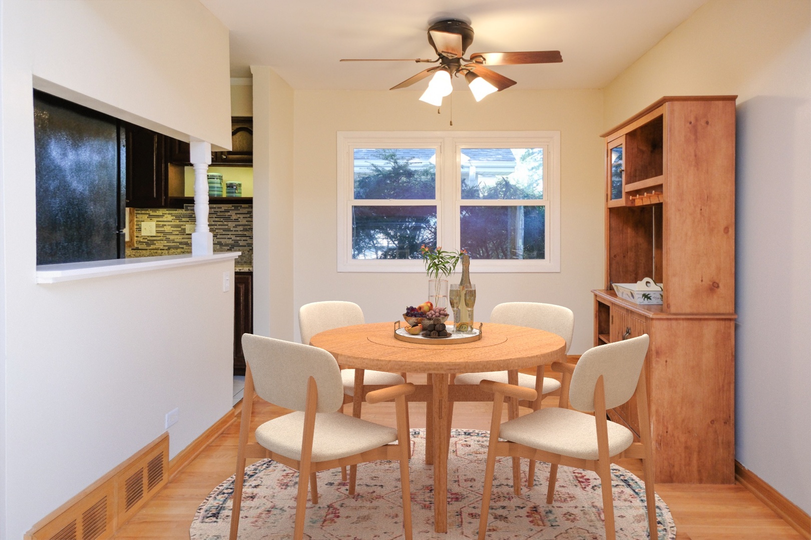 S586 East Street Winfield, IL 60190 - Photo 8 of 29 a view of a dining room with furniture window and wooden floor