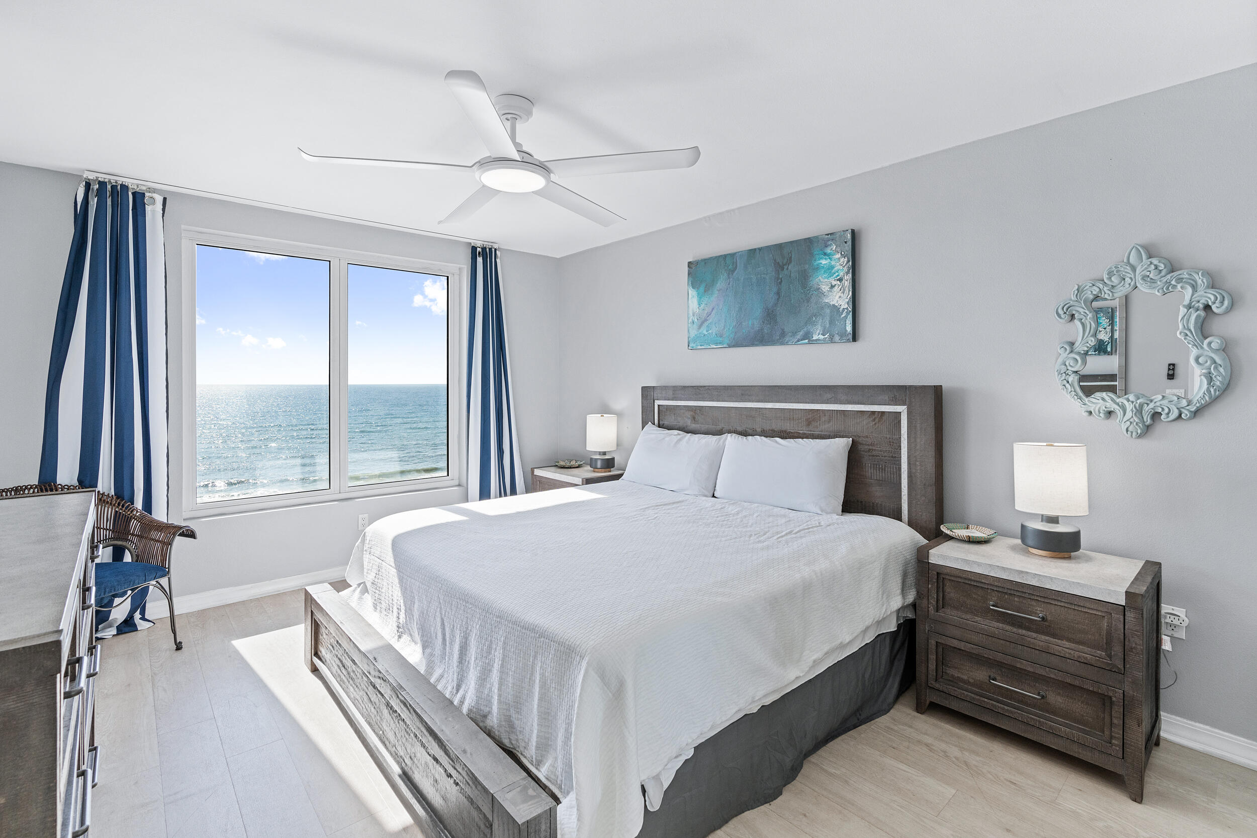 520 Santa Rosa Boulevard, Unit 705 Fort Walton Beach, FL 32548 - Photo 14 of 36 a bedroom with a large bed and a window