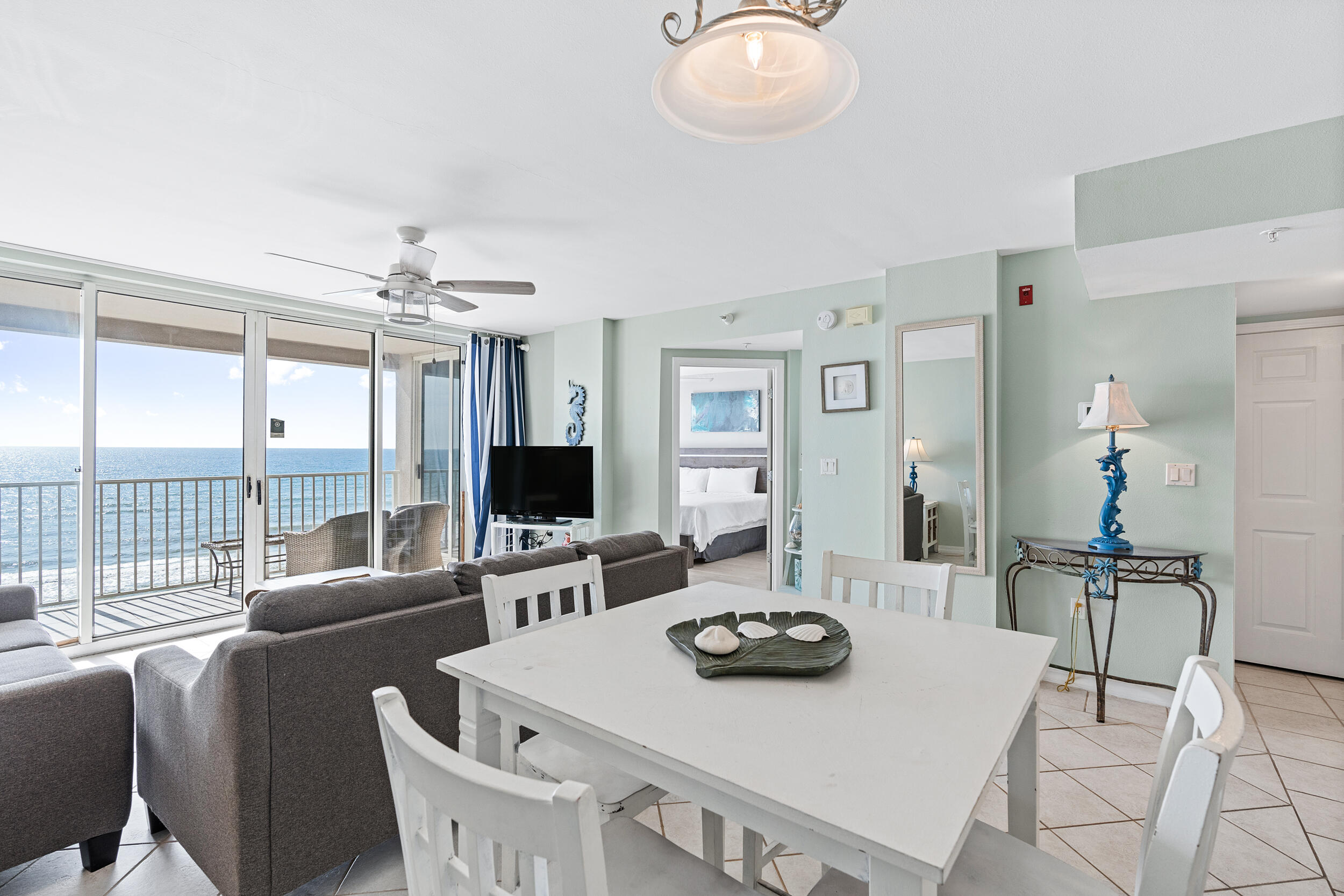 520 Santa Rosa Boulevard, Unit 705 Fort Walton Beach, FL 32548 - Photo 10 of 36 a living room with furniture and a flat screen tv