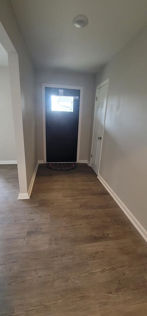 3327 College Avenue Columbus, GA 31907 - Photo 17 of 29 an empty room with wooden floor and windows