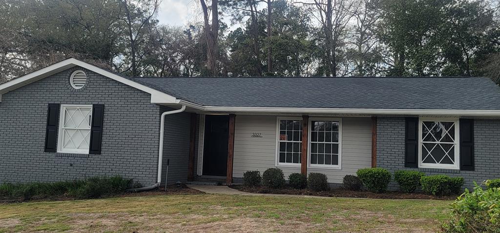 3327 College Avenue Columbus, GA 31907 - Photo 21 of 29 a front view of a house with garden