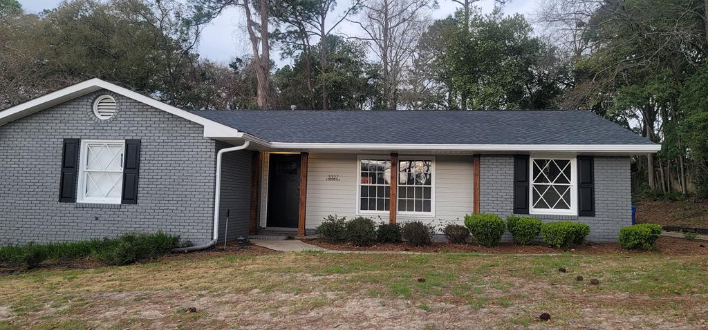 3327 College Avenue Columbus, GA 31907 - Photo 23 of 29 a front view of a house with garden
