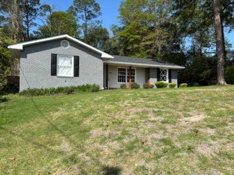 3327 College Avenue Columbus, GA 31907 - Photo 26 of 29 a view of a house with a yard