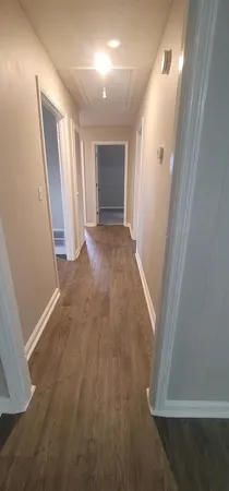 an entryway of a house with stairs