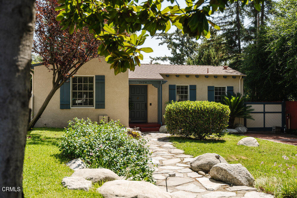 a house view with a garden space