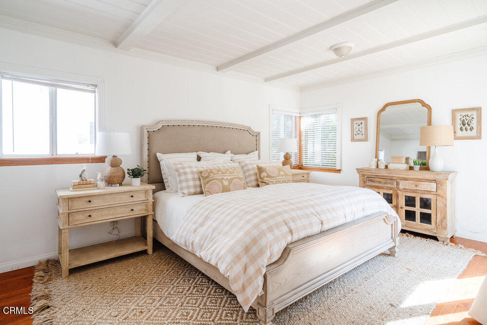 2484 Page Drive Altadena, CA 91001 - Photo 14 of 27 a spacious bedroom with a bed and a dresser