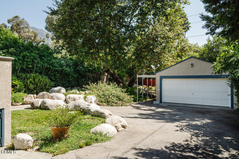 2484 Page Drive Altadena, CA 91001 - Photo 20 of 27 a front view of a house with a yard