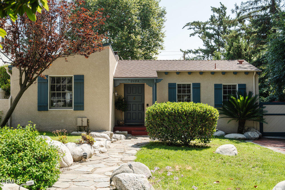 2484 Page Drive Altadena, CA 91001 - Photo 26 of 27 a view of a house with a yard chairs and table in a patio