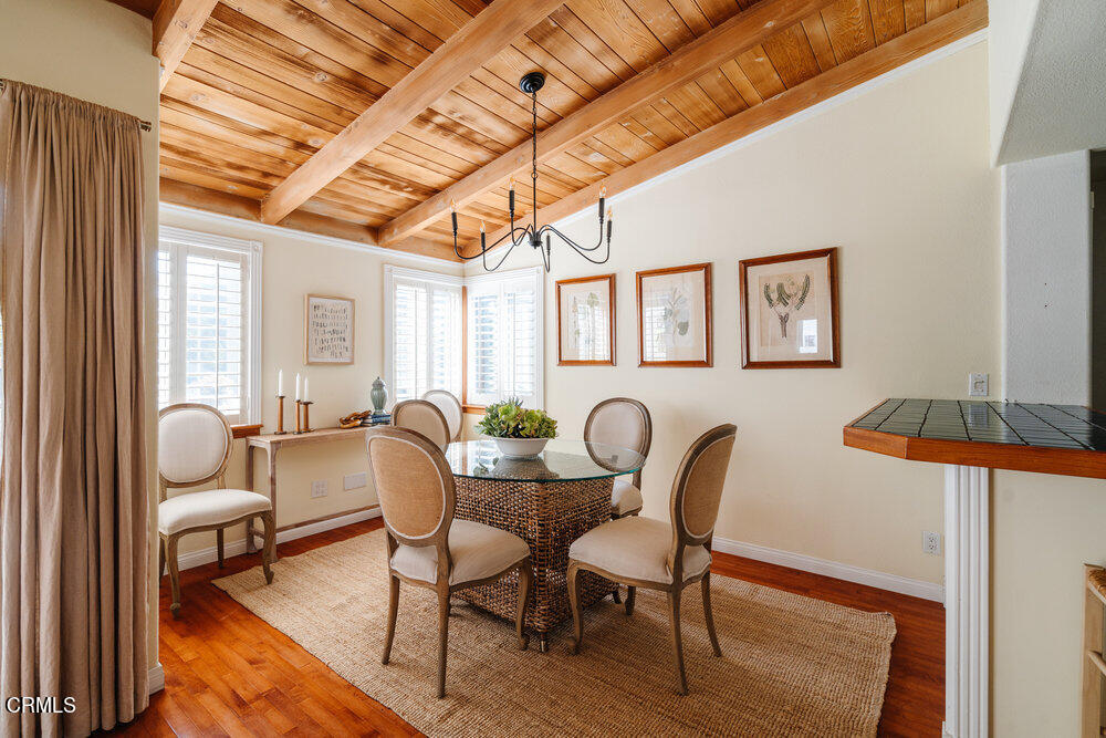 2484 Page Drive Altadena, CA 91001 - Photo 5 of 27 a dining room with furniture and a chandelier