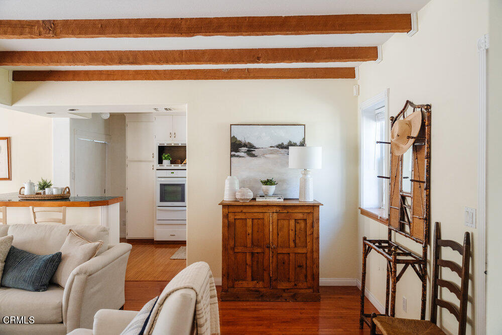 2484 Page Drive Altadena, CA 91001 - Photo 6 of 27 a living room with furniture a flat screen tv and a table