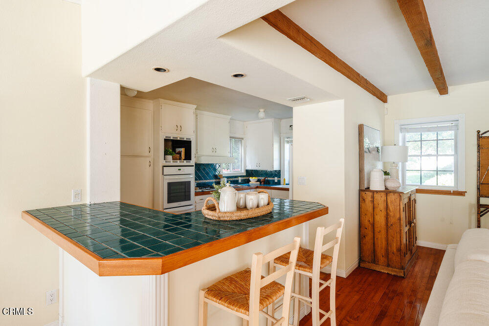 2484 Page Drive Altadena, CA 91001 - Photo 9 of 27 a kitchen with stainless steel appliances granite countertop a sink stove and refrigerator