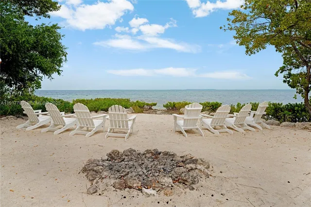 a view of a balcony with wooden floor