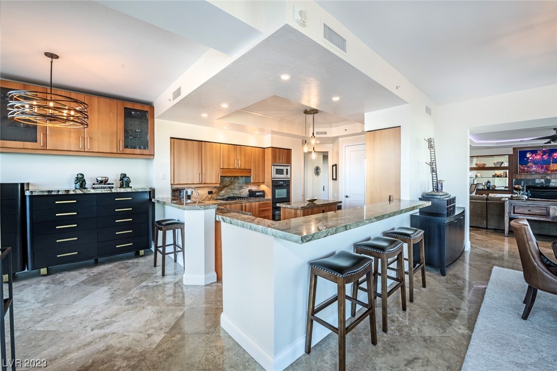 2857 Paradise Road, Unit 2303 Las Vegas, NV 89109 - Photo 11 of 37 BEAUTIFUL RENOVATED CHEFS KITCHEN