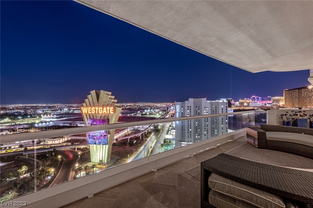 2857 Paradise Road, Unit 2303 Las Vegas, NV 89109 - Photo 28 of 37 ANOTHER LARGE VIEW DECK OFF PRIMARY SUITE AND OFFI