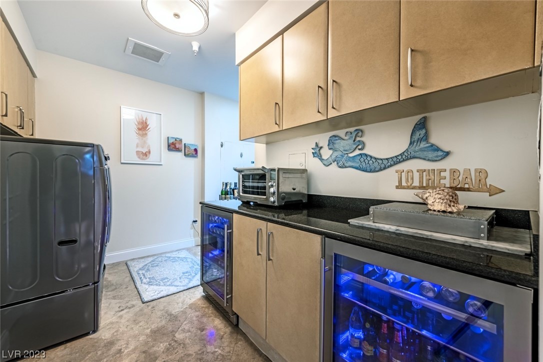 2857 Paradise Road, Unit 2303 Las Vegas, NV 89109 - Photo 36 of 37 VERY LARGE LAUNDRY ROOM WITH ABUNDANCE OF CABINETS