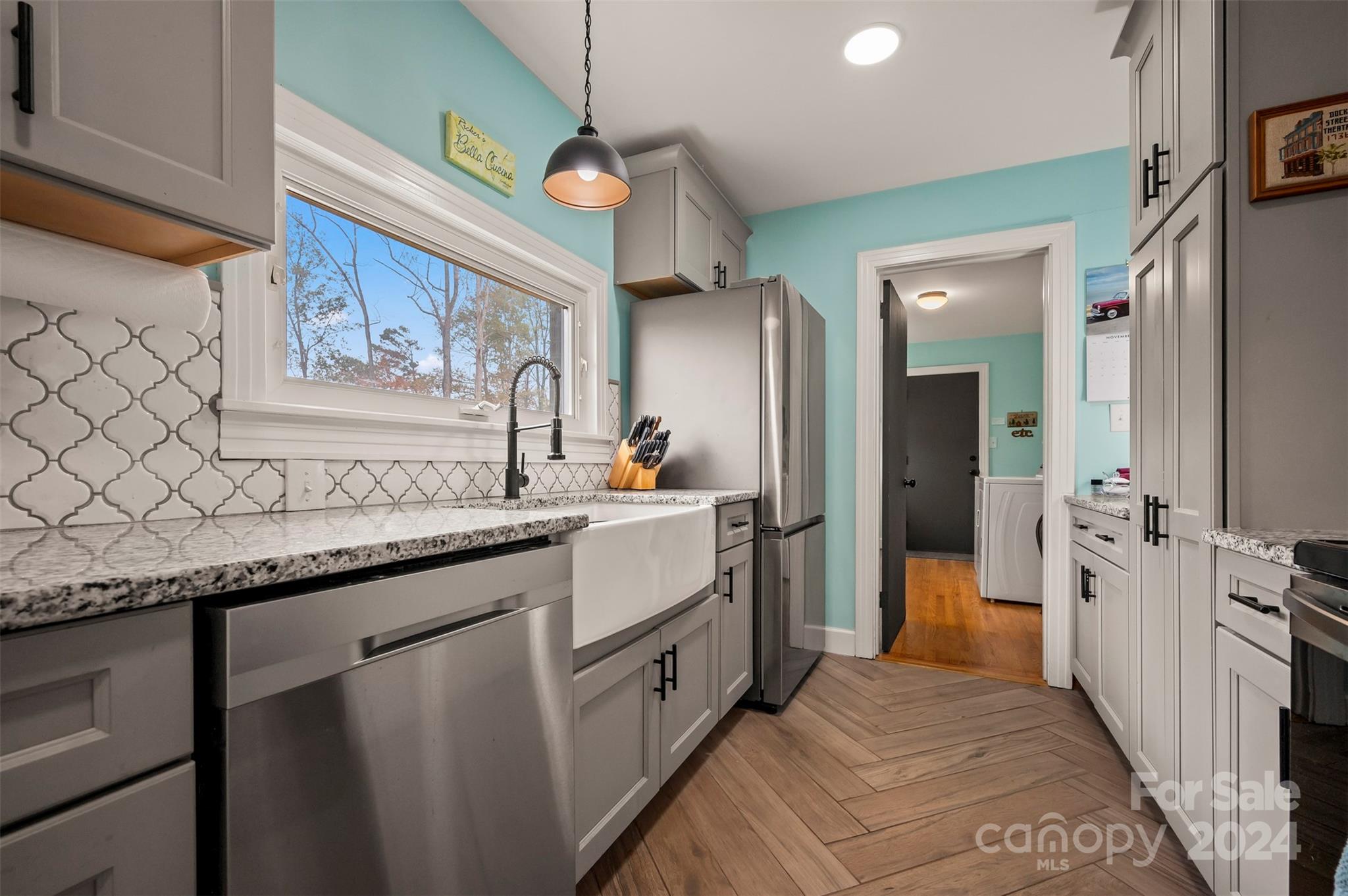 690-684 Chimney Rock Road Rutherfordton, NC 28139 - Photo 15 of 39 a kitchen with a sink stove and refrigerator